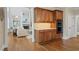 Open kitchen with custom cabinets, stainless appliances and granite countertops at 177 Grandmar Chase, Canton, GA 30115