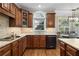 Charming kitchen featuring custom cabinetry and sleek, modern appliances at 177 Grandmar Chase, Canton, GA 30115