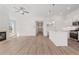 Spacious open floorplan with a fireplace, modern kitchen, and plenty of natural light at 1216 Cedarcrest Blvd, Acworth, GA 30101