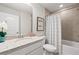 Well-appointed bathroom with granite countertops, tiled floors, and a shower-tub combo at 1220 Cedarcrest Blvd, Acworth, GA 30101