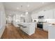 Modern kitchen with white cabinets, stainless steel appliances, and a center island with seating at 1220 Cedarcrest Blvd, Acworth, GA 30101