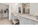 Luxurious bathroom featuring double sinks, granite countertops, tiled floors, and a glass shower at 1220 Cedarcrest Blvd, Acworth, GA 30101