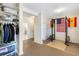 Finished basement area featuring fitness equipment, storage shelving and easy bathroom access at 1862 Lake Ebenezer Trl, Marietta, GA 30066