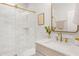 Elegant bathroom featuring a marble walk-in shower, modern vanity with gold fixtures, and tasteful decor at 1862 Lake Ebenezer Trl, Marietta, GA 30066