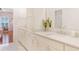 Bathroom with marble floors, double sinks, and a glass enclosed shower at 1862 Lake Ebenezer Trl, Marietta, GA 30066
