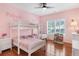 bedroom with bunk beds, hardwood floors and a ceiling fan at 1862 Lake Ebenezer Trl, Marietta, GA 30066