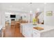 Open-concept kitchen featuring a large island, pendant lighting, and seamless flow into the living spaces at 1862 Lake Ebenezer Trl, Marietta, GA 30066