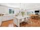 Spacious kitchen with white cabinets, large island with bar seating, stainless steel appliances, and open layout at 1862 Lake Ebenezer Trl, Marietta, GA 30066