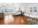 Spacious main bedroom featuring tray ceilings, hardwood floors and lots of natural light at 1862 Lake Ebenezer Trl, Marietta, GA 30066