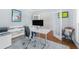 Stylish office featuring modern furniture, hardwood floors, and neutral decor for a productive workspace at 1862 Lake Ebenezer Trl, Marietta, GA 30066
