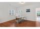 Bright office space featuring hardwood floors, a desk, and natural light from the windows at 1862 Lake Ebenezer Trl, Marietta, GA 30066