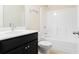 Clean bathroom with a vanity, mirror, sink, and shower at 2813 White Oak Ln, Decatur, GA 30032