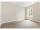 Bedroom with neutral walls and carpeted floors at 2813 White Oak Ln, Decatur, GA 30032