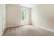 Bedroom with neutral walls and carpeted floors at 2813 White Oak Ln, Decatur, GA 30032