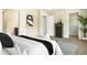 Spacious bedroom featuring a walk-in closet, ensuite bathroom, and neutral color scheme at 2813 White Oak Ln, Decatur, GA 30032