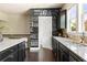 Kitchen view featuring dark cabinets and a chalkboard wall with custom art at 2813 White Oak Ln, Decatur, GA 30032