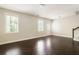 Bright living room with hardwood floors and natural light from windows at 2813 White Oak Ln, Decatur, GA 30032