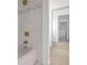 This bathroom features a shower/tub combination, with tile walls at 3475 Oak Valley Rd # Apt 650, Atlanta, GA 30326