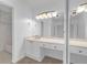 Spacious bathroom vanity with dual mirrors and ample lighting at 3475 Oak Valley Rd # Apt 650, Atlanta, GA 30326