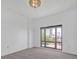 Bedroom with neutral walls, carpet flooring and window view of cityscape at 3475 Oak Valley Rd # Apt 650, Atlanta, GA 30326