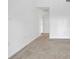 Bright living room featuring neutral carpet and white walls, providing a clean and spacious feel at 3475 Oak Valley Rd # Apt 650, Atlanta, GA 30326