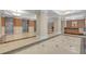 Grand lobby featuring elegant marble floors, elevator access, and a concierge desk at 3475 Oak Valley Rd # Apt 650, Atlanta, GA 30326