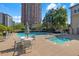Relaxing pool area with lounge chairs, a spa, and a tranquil outdoor space at 3475 Oak Valley Rd # Apt 650, Atlanta, GA 30326