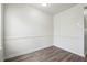 The dining area features chair-rail moulding and wood-look laminate flooring at 4282 Worth Nw St, Acworth, GA 30101