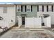 Back exterior of home featuring a fenced in patio and parking spaces at 4282 Worth Nw St, Acworth, GA 30101