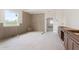 Bright bathroom featuring a tiled walk-in shower, modern fixtures, and vanity awaiting installation for a spa-like feel at 5694 Brendlynn Dr, Suwanee, GA 30024