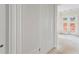 Elegant living room featuring decorative wall trim, and lots of natural light at 5694 Brendlynn Dr, Suwanee, GA 30024
