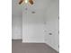 Simple bedroom with a ceiling fan and closet door provides an open, customizable space at 3475 Oak Valley Rd # 660, Atlanta, GA 30326