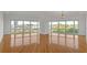 Bright living room with hardwood floors and large windows offering ample natural light and city views at 3475 Oak Valley Rd # 660, Atlanta, GA 30326