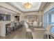 An elegant lounge featuring a bar area, dining space, and modern lighting fixtures at 3475 Oak Valley Rd # 660, Atlanta, GA 30326