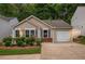 Charming single-story home with manicured front yard, attached garage, and welcoming curb appeal at 624 Spanish Oak Dr, Acworth, GA 30102