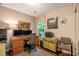 This home office features neutral paint, hard wood floors and built-in shelving at 624 Spanish Oak Dr, Acworth, GA 30102