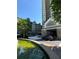 Exterior shot of buildings, fountain and covered entry at 799 Hammond Dr # 321, Atlanta, GA 30328