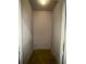 Small closet with stained concrete floors and blank walls at 799 Hammond Dr # 321, Atlanta, GA 30328