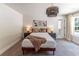 Cozy bedroom with modern art and a stylish chandelier offers a peaceful retreat at 842 Bridgewater Sw St, Atlanta, GA 30310