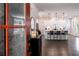 Stylish kitchen featuring white cabinets, a large island, and modern pendant lighting at 842 Bridgewater Sw St, Atlanta, GA 30310