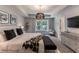 Spacious main bedroom with tray ceiling and modern furnishings at 842 Bridgewater Sw St, Atlanta, GA 30310