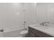 Modern bathroom with subway tiled shower-tub, and stylish vanity at 2023 Fern Mountain Ln, Marietta, GA 30064