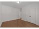 Bright bedroom with hardwood floors and a double door closet at 2023 Fern Mountain Ln, Marietta, GA 30064