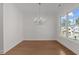 Open dining room featuring hardwood floors, chandelier and natural light at 2023 Fern Mountain Ln, Marietta, GA 30064