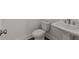 Clean powder room featuring a pedestal sink, and white toilet at 2023 Fern Mountain Ln, Marietta, GA 30064