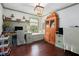 Stylish home office with a built-in desk, window seat, and ample storage space at 297 Breeze Hill Ln, Canton, GA 30114
