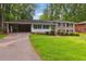 Charming brick home with well-maintained lawn and inviting front porch, great curb appeal at 3925 Chicamauga Ne Dr, Kennesaw, GA 30144