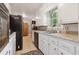 Functional kitchen features modern appliances, sleek countertops, and ample cabinet space at 3925 Chicamauga Ne Dr, Kennesaw, GA 30144