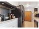 Updated kitchen with modern cooktop, stainless steel appliances, and convenient storage solutions at 3925 Chicamauga Ne Dr, Kennesaw, GA 30144