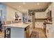 Bright, modern kitchen with a large center island, stainless steel appliances, and stylish decor at 1014 Starmoss Ln, Conyers, GA 30094